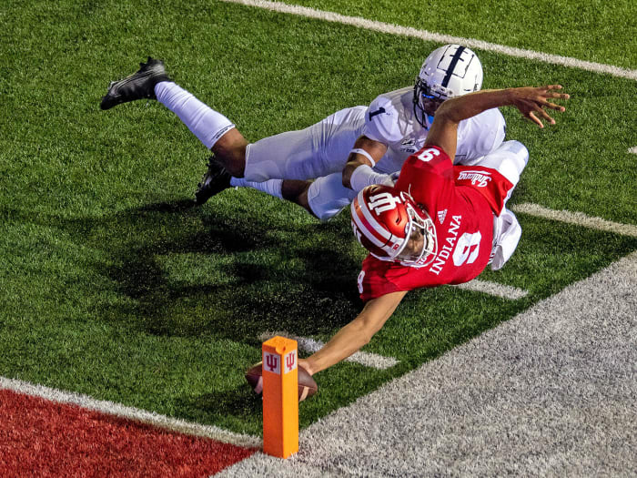 Michael Penix Jr. lunges for the game-winning two-point conversion